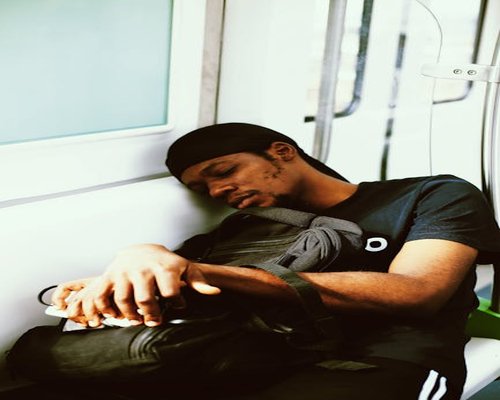 Commuters maintaining a relaxed posture on public transport